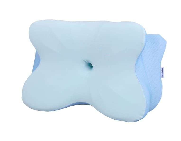 Light blue Derila Ergo pillow with a contoured shape and central head cradle